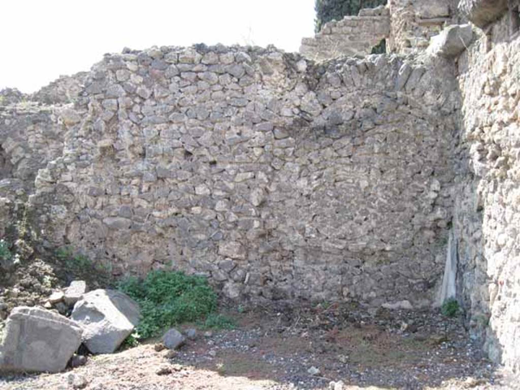 VIII.7.23 Pompeii. September 2010. West wall. Photo courtesy of Drew Baker. This is most likely the site of the internal two small rooms. There may be the remains of an arched ceiling, on the right.
