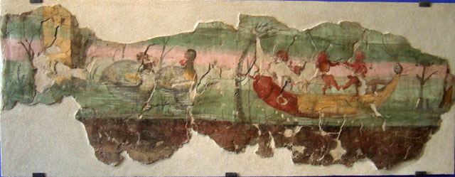 VIII.7.24 Pompeii. Found on the north wall of the peristyle in 1955. Nile scene. 
Two pygmies dance on a papyrus boat with phallic prow.
Fragment of a painting originally part of a larger illustration with Nilotic subject that decorated the peristyle. 
SAP inventory number 41654.
About 24 metres remained. 
A description of the entire fresco covering the peristyle wall can be found in Roman domestic art and early house churches, by David L. Balch, p. 221-3. 
See POMPEI 1748-1980, i tempi della documentazione, p. 164-5, 20 C3.
Maiuri gives a complete description of the house and the paintings found.
See Maiuri, A., 1955. Una nuova pittura nilotica a Pompei. Rome: Acc. Nazionale dei Lincei.


