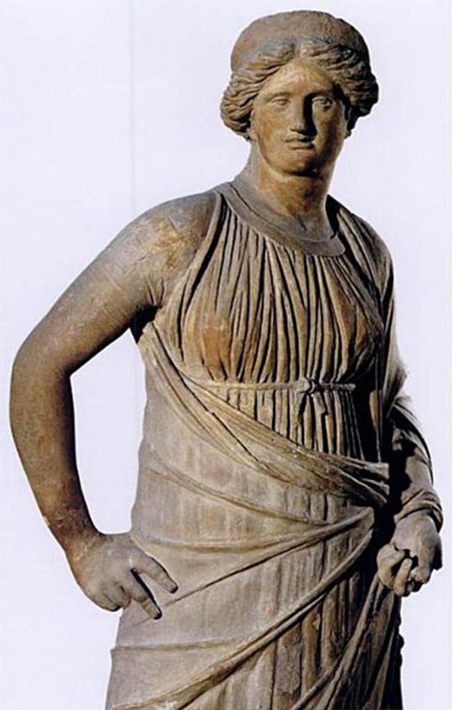 VIII.7.25 Pompeii. Terracotta statue of a female goddess found in the cella. The statue was considered to be a representation of Hygeia. She was the daughter of Aesculapius and Epione and was goddess of health, cleanliness, and sanitation. Now in Naples Archaeological Museum. Inventory number 22575.