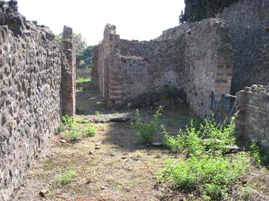 VIII.7.26 Pompeii. September 2010. Looking south across room behind main entrance room. Entrance 27A on right of image, enters from the alleyway leading towards the theatre. Photo courtesy of Drew Baker.
