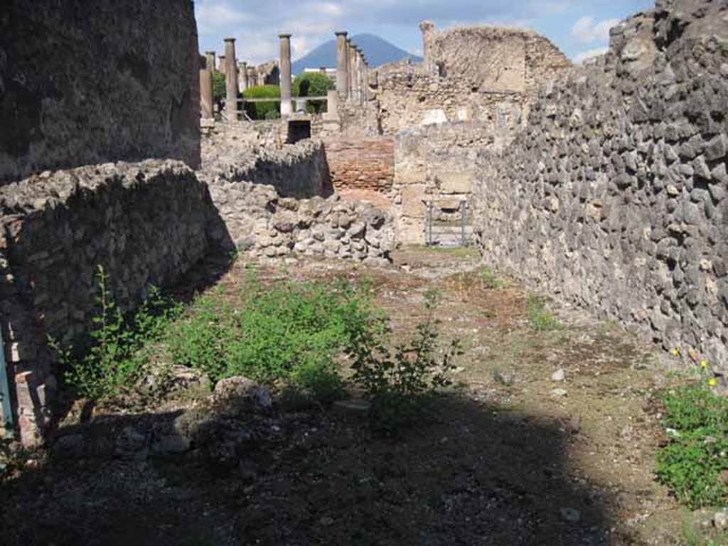 VIII.7.26 Pompeii. September 2010. Looking north across room behind main entrance room, towards Via del Tempio dIside. Entrance 27A on left of image, enters from the alleyway leading from the theatre. Photo courtesy of Drew Baker.
