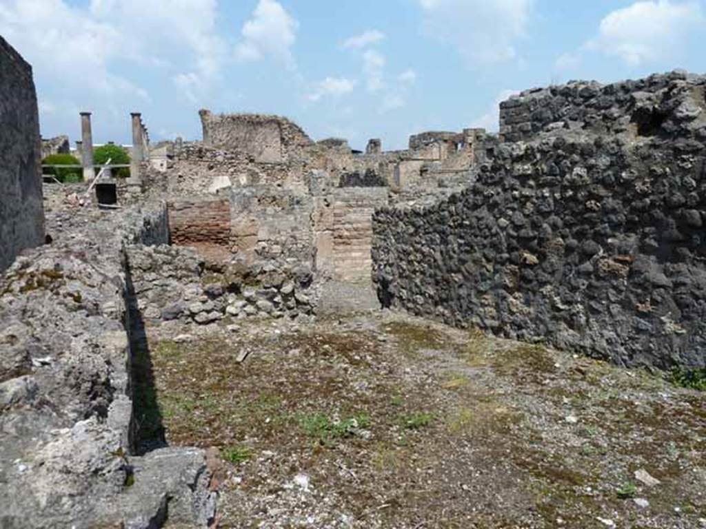 VIII.7.26 Pompeii. May 2010. Looking north towards the corridor to the front, taken from the rear side entrance in the alley at the side of the Temple of Isis.