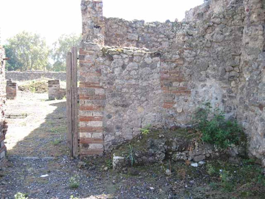 VIII.7.26 Pompeii. September 2010. South wall of room, looking south into atrium. Photo courtesy of Drew Baker.
According to the plan by W. Gell (see Part 2) the structure remaining, on the right, would have been another stairs to upper floor.

