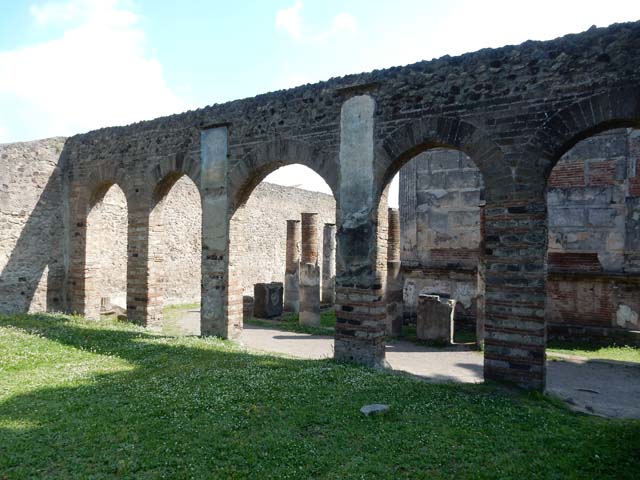 VIII.7.28, Pompeii. May 2015. Looking out through the arches of the Ekklesiasterion on to the west portico and north portico. 
Photo courtesy of Buzz Ferebee.
