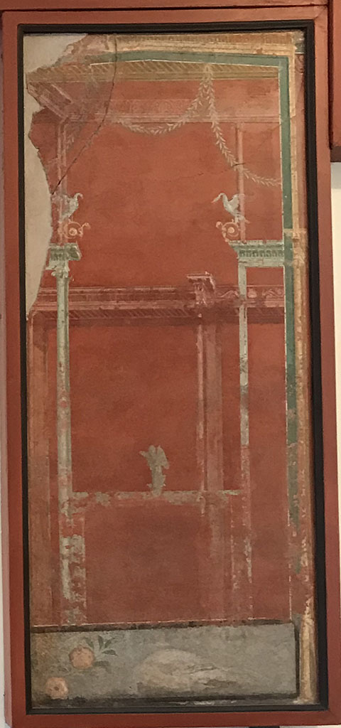 VIII.7.28 Pompeii. April 2019. West portico. 
Fresco with architecture, swans, bronze sphinx and still life panel with two peaches and dead pigeon.
Now in Naples Archaeological Museum. Inventory number 8536.
Photo courtesy of Rick Bauer.