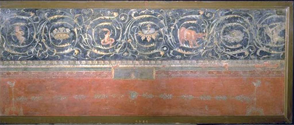 VIII.7.28 Pompeii. From the south part of the west portico 
Painting of upper part of wall with spiral frieze. 
In the red panel below are two candelabra each mounted by a dove.
Now in Naples Archaeological Museum. Inventory number 8546.


