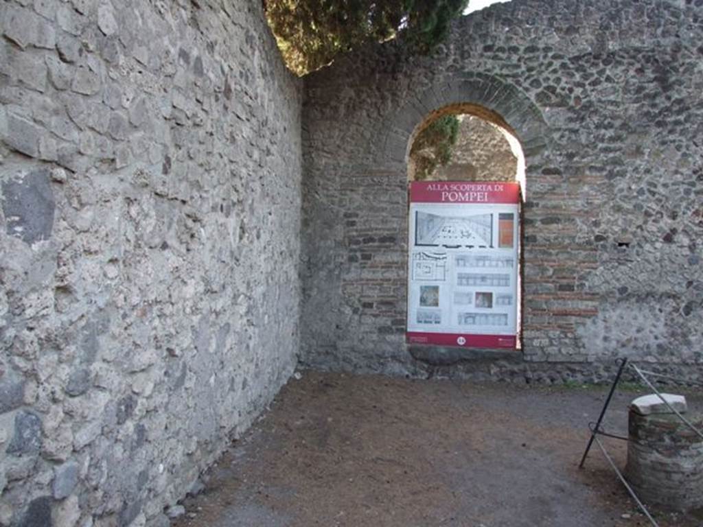 VIII.7.28 Pompeii. December 2007. South-west corner of portico.
In the south-west corner of the portico, on the west wall, a statue of Venus Anadyomene was found. 
In the same corner on the south wall stood the herm of Gaius Norbanus Sorex.
The arched entrance leads to an irregular shaped sacred room.
