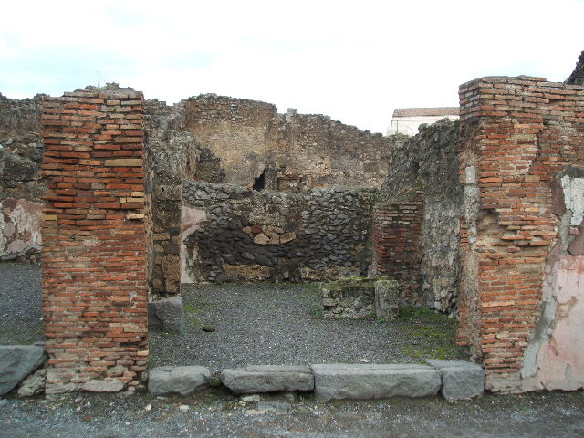IX.1.2 Pompeii. March 2009. North wall of shop.