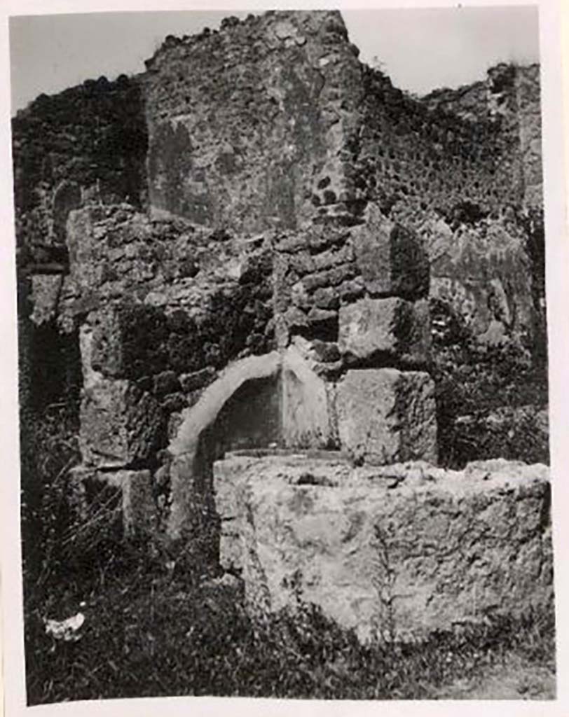 IX.1.3 Pompeii. Pre-1943. 
According to Warscher, this photo shows a structure on “the north-east corner of the second division.” 
She wrote, “If I am not mistaken here are the remains of a kneading trough.”
See Warscher, T. Codex Topographicus Pompeianus, IX.1. (1943), Swedish Institute, Rome. (no.8), p. 21.
