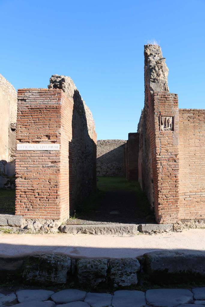 IX.1.5 Pompeii. December 2018. 
Entrance doorway on east side of Via Stabiana. Photo courtesy of Aude Durand.
