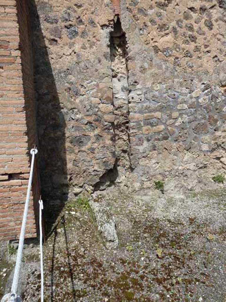 IX.1.6 Pompeii. May 2010. Site of latrine, under stairs to upper floor, on north side of entrance.