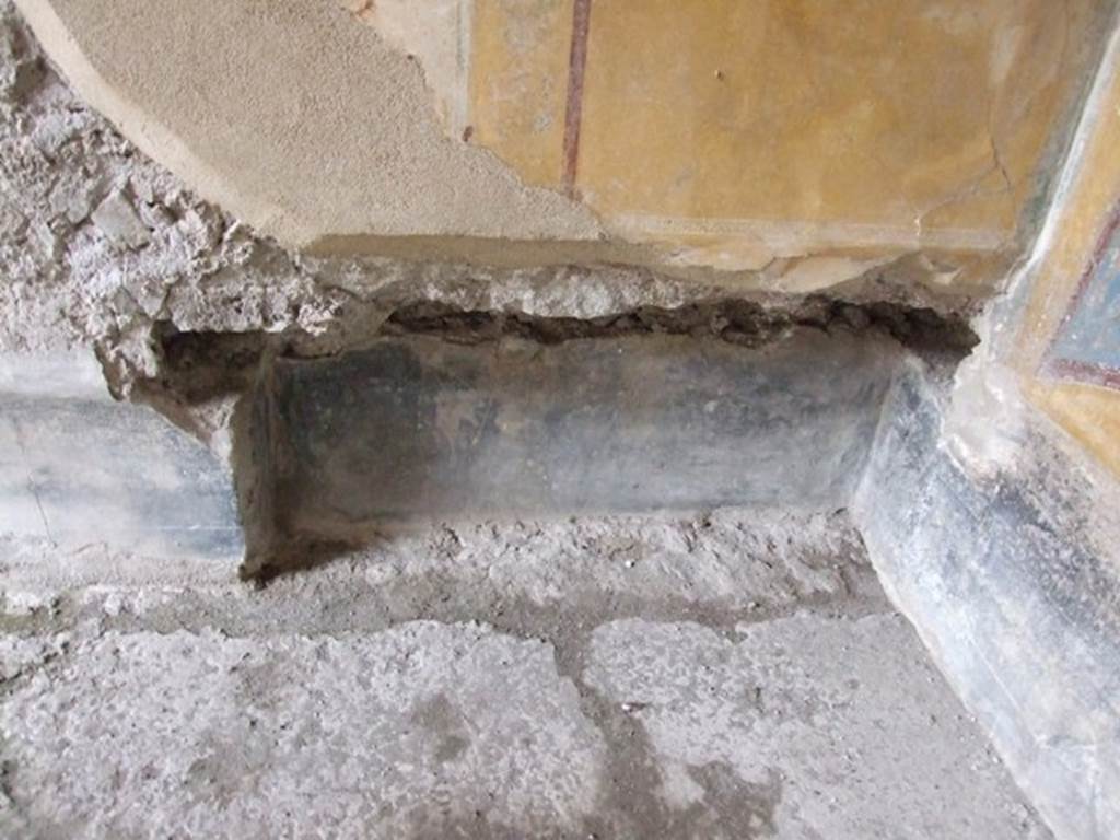 IX.1.7 Pompeii. December 2007. Triclinium, recess at base of painted plaster in south-west corner.
