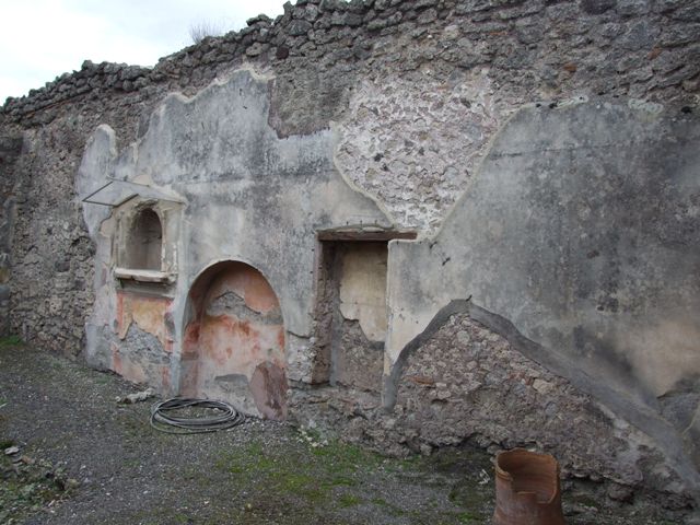 IX.1.7 Pompeii.  Niche with stucco of a shell and figures.  Detail from old undated photograph courtesy of Society of Antiquaries: Fox Collection.

