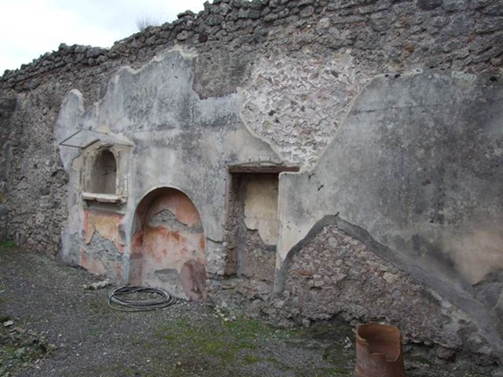 IX.1.7 Pompeii.  December 2007.  Three niches on south wall of atrium.