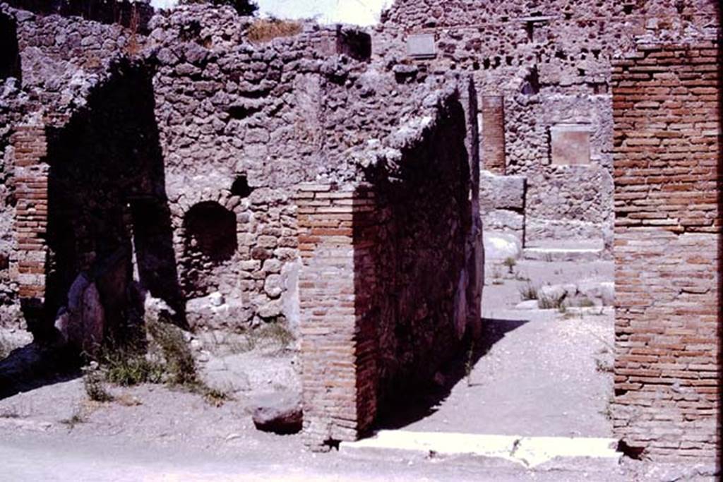 IX.1.11 Pompeii. 1966. Entrance doorway, on left, and doorway to IX.1.12 on right. Photo by Stanley A. Jashemski.
Source: The Wilhelmina and Stanley A. Jashemski archive in the University of Maryland Library, Special Collections (See collection page) and made available under the Creative Commons Attribution-Non Commercial License v.4. See Licence and use details.
J66f0116

