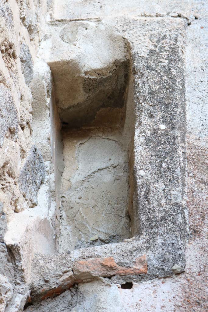 IX.1.12 Pompeii. December 2018. 
Recess on east wall above doorway to cubiculum on east side of peristyle. Photo courtesy of Aude Durand.
