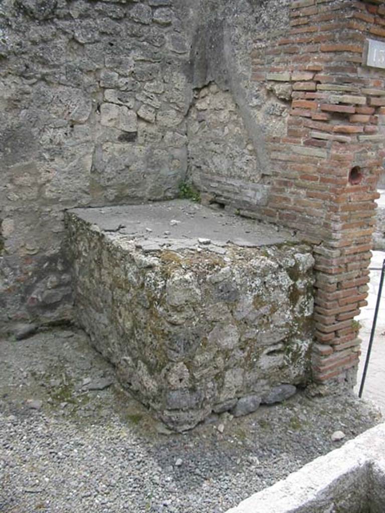 IX.1.13 Pompeii. May 2003. Hearth on south side of shop-room. Photo courtesy of Nicolas Monteix. 