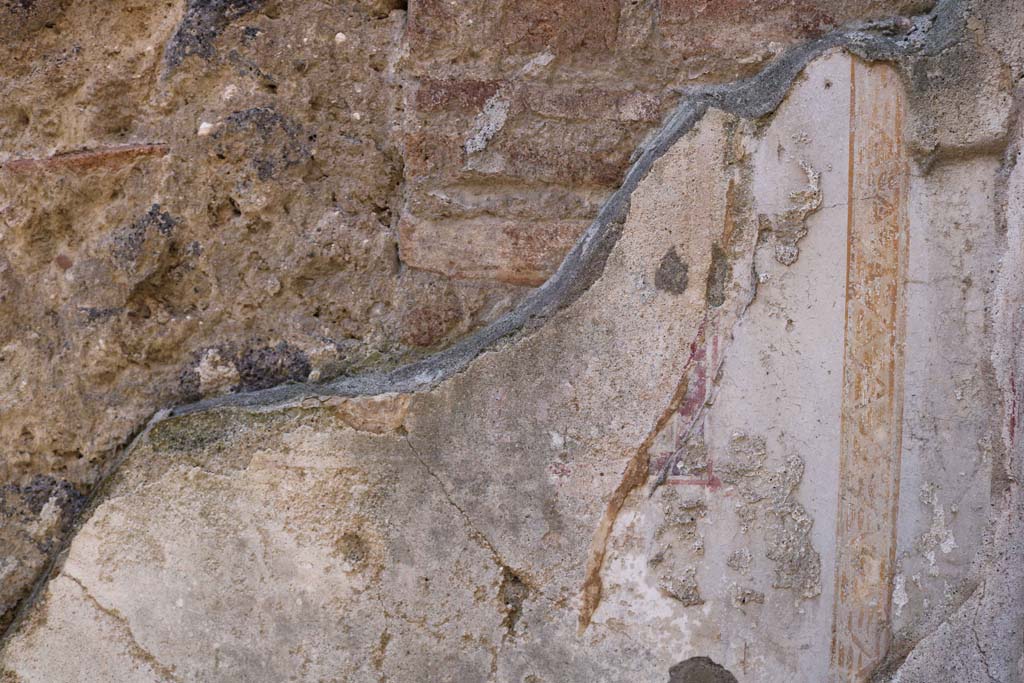 IX.1.16 Pompeii. December 2018. 
Detail of painted decoration from west wall in north-west corner of rear room. Photo courtesy of Aude Durand.

