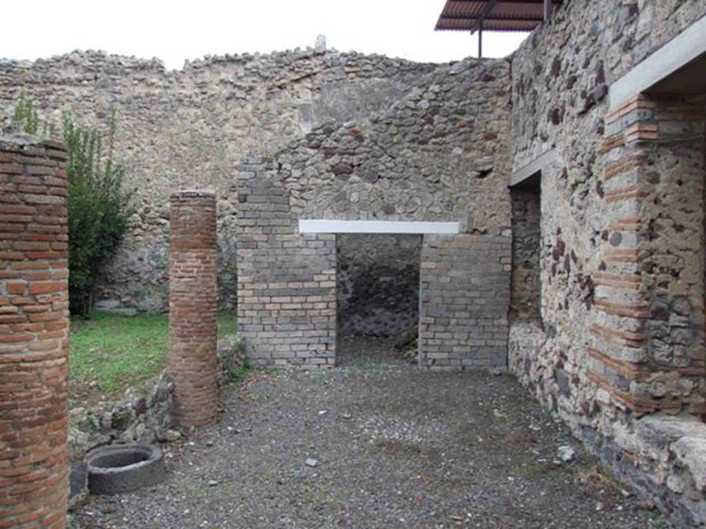 IX.1.20 Pompeii.  December 2007.  Room 12.  Looking east along rear wall of Tablinum and Triclinium windows to room on east side.
