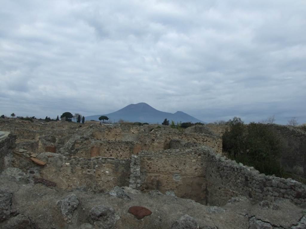 IX.1.20 Pompeii. December 2007. Room 16, view from upper floor.
Looking north across IX.1 towards Vesuvius
