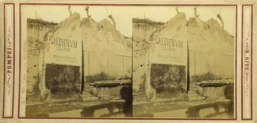 IX.1.20 Pompeii. Stereoview by R. Rive, c.1860 -1870s, showing painted graffiti on pilaster between IX.1.19 and IX.1.20, together with decorated front façade before 1943 bombing.
Photo courtesy of Rick Bauer.
According to CIL IV, the painted recommendation, found in March 1858, was

M. EPIDIVM
SABINVM
II VIR IVR DIC O V F DIGNVM  IVVENEM
SVEDIVS  CLEMENS  SANCTISSIMVS
IVDEX  FACIT  VICINIS  ROGANTIBVS

According to Epigraphik-Datenbank Clauss/Slaby (See www.manfredclauss.de) this expands to

M(arcum) Epidium
Sabinum
IIvir(um) iur(e) dic(undo) o(ro) v(os) f(aciatis) dignum iuvenem
Suedius Clemens sanctissimus
iudex facit vicinis rogantibus      [CIL IV 1059]

According to Cooley, this translates as
We beg you to elect Marcus Epidius Sabinus duumvir with judicial power,
a worthy young man. Suedius Clemens, most venerable judge, elects him at
the request of his neighbours.
See Cooley, A. and M.G.L., 2004. Pompeii: A Sourcebook. London: Routledge, p. 136, F114.
