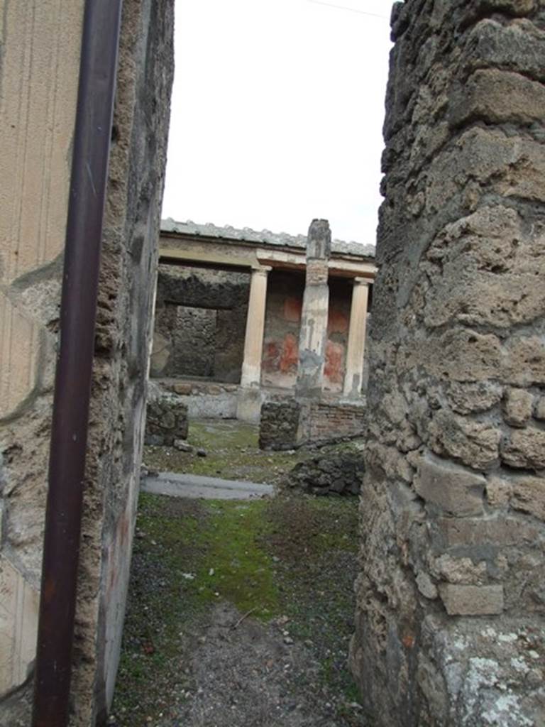 IX.1.22 Pompeii. December 2007.  Doorway to corridor with small room on its eastern side, between room 6 and room 7. According to Bragantini, when found this room had a black dado, and the middle zone was painted with purple panels separated by borders. 
See Bragantini, de Vos, Badoni, 1986. Pitture e Pavimenti di Pompei, Parte 3. Rome: ICCD. (p.401, corridoio ‘k’) 
