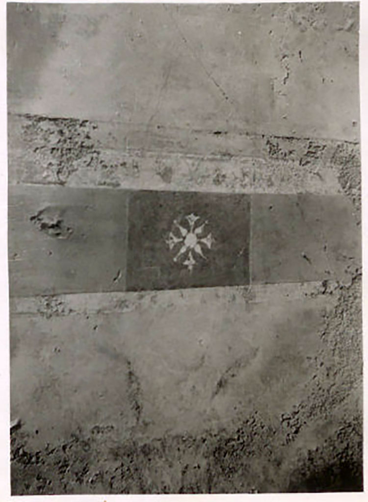 IX.1.22 Pompeii. Pre-1943. 
Room 19, painted star, from under the area of the central painting of west wall. Photo by Tatiana Warscher.
See Warscher, T. Codex Topographicus Pompeianus, IX.1. (1943), Swedish Institute, Rome. (no.137), p. 236.

