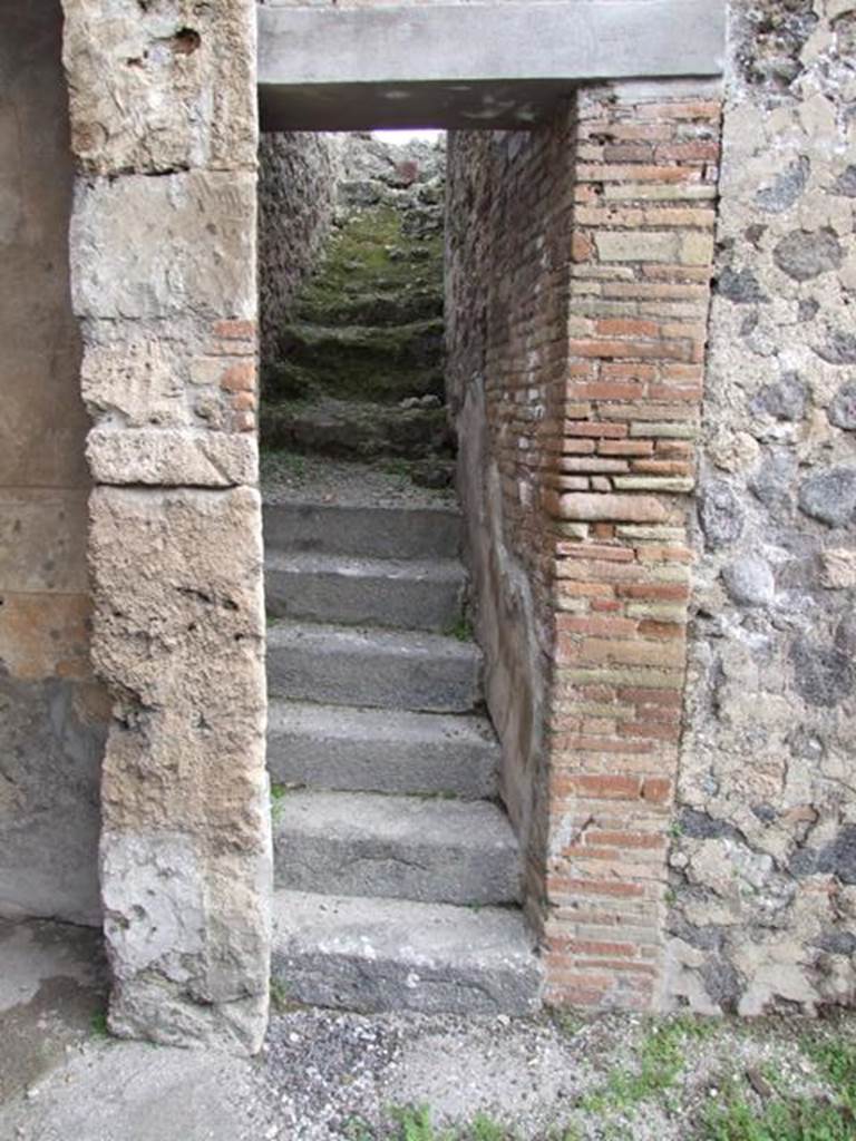 IX.1.22 House of M. Epidi Sabini.  December 2007.  Stone staircase between rooms 25 and 28.
