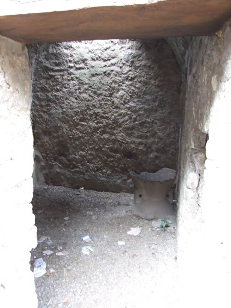 IX.1.22 Pompeii. December 2007. Room 29, doorway into bakery workshop for the working of the bread, with barrel-vaulted ceiling and square window at its east end. 
