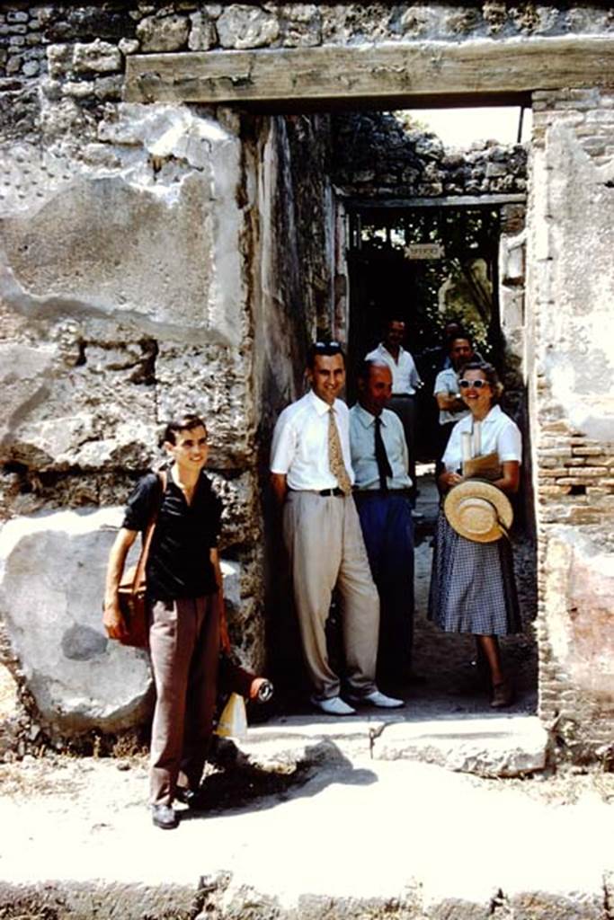 IX.1.26 Pompeii. 1961. Wilhelmina and friends in entrance corridor.  Photo by Stanley A. Jashemski.
Source: The Wilhelmina and Stanley A. Jashemski archive in the University of Maryland Library, Special Collections (See collection page) and made available under the Creative Commons Attribution-Non Commercial License v.4. See Licence and use details.
J61f0867
