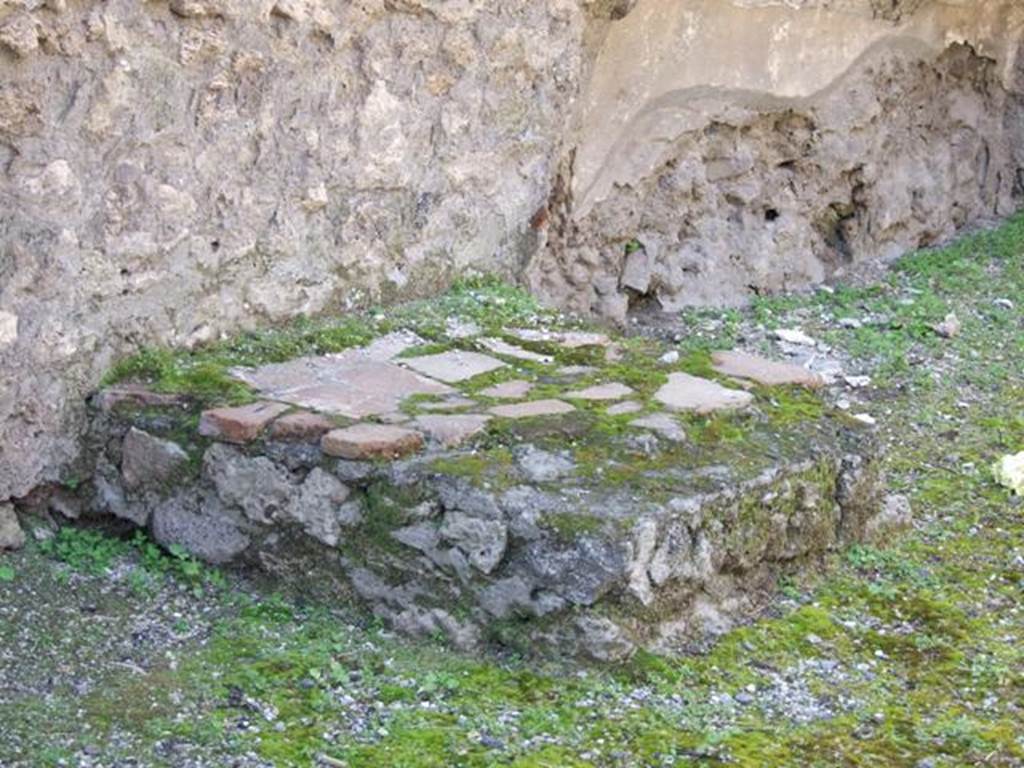 IX.1.27 Pompeii.  March 2009.  Base of stairs to upper floor, against west wall.