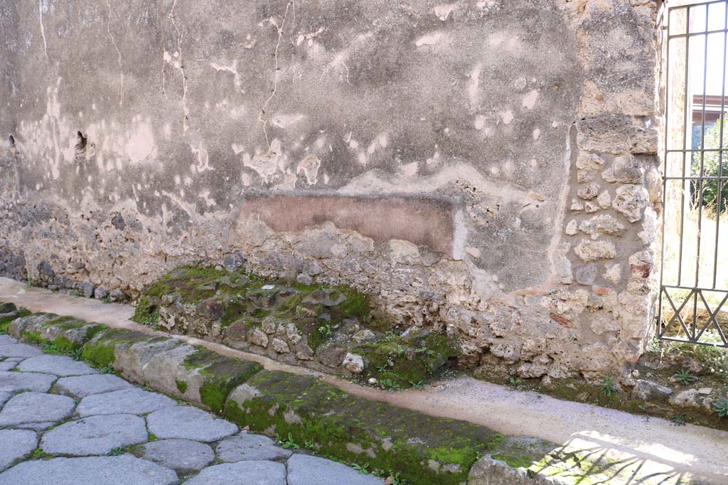 IX.1.30 Pompeii. December 2018. Structure on pavement outside doorway in Vicolo di Balbo. Photo courtesy of Aude Durand.