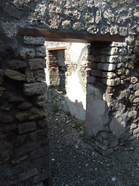 IX.2.18 Pompeii. March 2009.  Doorway to Room 10, Triclinium.

