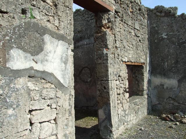 IX.2.18 Pompeii. March 2009.  Doorway and window to Room 3, Triclinium.