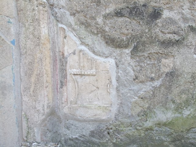 IX.3.5 Pompeii.  March 2009.  Room 21.  Corridor.  South wall. Painted plaster, and steps to lower level.