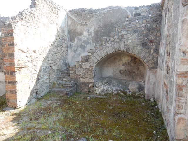 IX.3.5 Pompeii. March 2009. Room 30. Atrium. North west corner with remains of painted plaster.