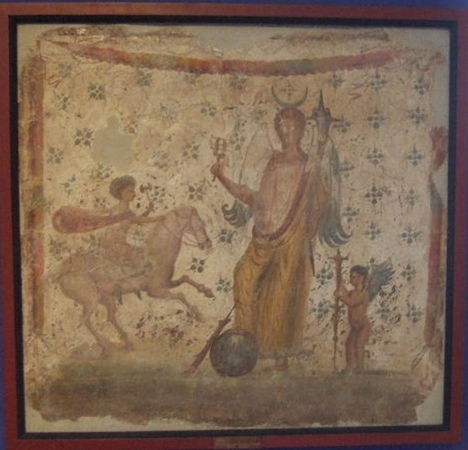 IX.3.7 Pompeii.  Picture of Isis Fortuna with horn of plenty and sistrum and with a foot on a globe. 
To the right is Hesperus and left is Helios or Harpocrates - Helios.
Now in Naples Archaeological Museum, where it is shown as from IX.3.15. 
Frhlich says this picture was found on the north wall of the shop IX.3.7.
He points out that the painting was described by Panofka in 1847, so it could not be IX.3.15 which was first excavated in 1861.
See Frhlich, T., 1991, Lararien und Fassadenbilder in den Vesuvstdten.  Mainz: von Zabern.  (L101: p.294).

Others believe the painting of Isis-Fortuna (MN 8836) was found in 1847 in IX, iii, 15 on the north wall of a cubiculum.  
It was discovered while carrying out work on one of the walls of the Casa di Suonatrici which joined the two houses. 
Our thanks to Raffaele Prisciandaro for his help in identifying the following sources:
Casa di Philocalus; parete N del cubicolo; CIL 04, 882 (197); 
Bulletino Archeologico Italiano, 1, 1862, n. 20, 1862, pp. 159 160; 
Panofka, BdI 1847, pp. 127-128 nellappoggiar una delle mura della casa delle Suonatrici si  scoperta al muro della casa accanto una pittura  

According to PPM, there was no agreement on whether the painting depicting Isis-Fortuna, now at Naples Museum, came from this shop.
See Bragantini I., in 1990-2003. Pompei: Pitture e Mosaici.  Roma: Istituto della enciclopedia italiana, Vol. IX, p.314, p. 335.
