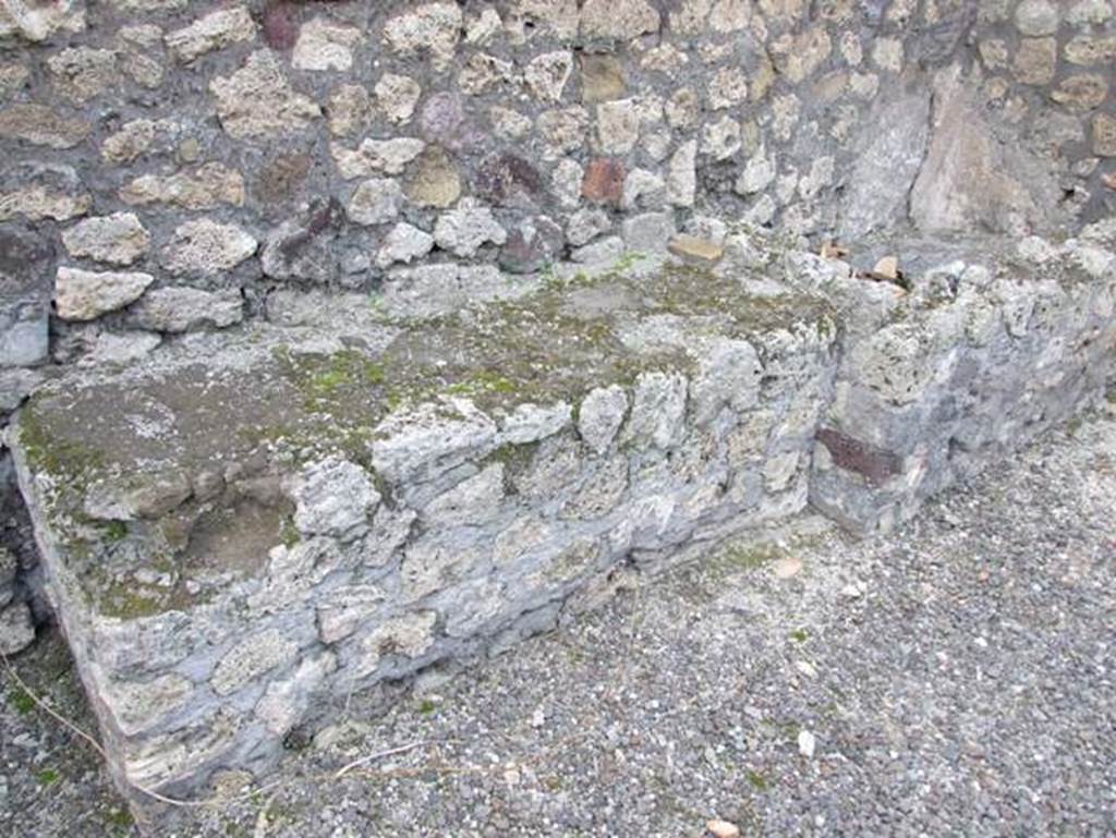 IX.3.17  Pompeii.  March 2009.   West side of workshop.    Remains of bench with water basin.