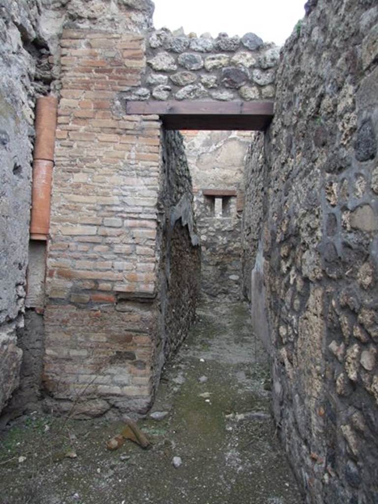 IX.3.17  Pompeii.  March 2009.  Corridor leading north to Kitchen and Latrine.