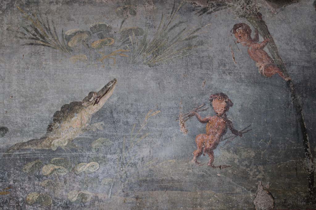 IX.5.9 Pompeii. May 2019. Room l (L), detail from a scene of crocodile with two pygmies.  
Foto Christian Beck, ERC Grant 681269 DCOR.

