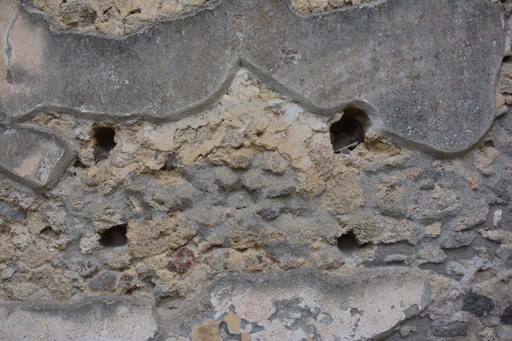 IX.5.14 Pompeii. May 2017. North ala e, detail from centre of north wall of holes for supports for shelving.
Foto Christian Beck, ERC Grant 681269 DCOR.
