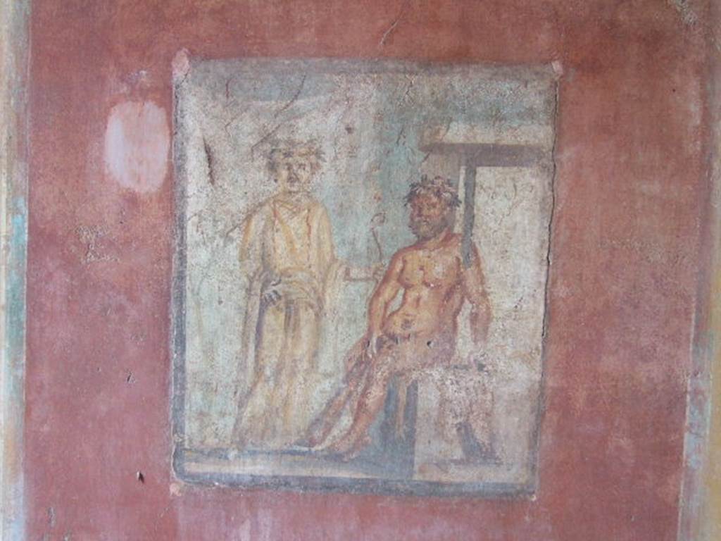 IX.5.14 Pompeii. May 2005. Cubiculum g, on south side of entrance doorway.
Wall painting of Hercules and Omphale, found on north wall.
See Bragantini, de Vos, Badoni, 1986. Pitture e Pavimenti di Pompei, Parte 3. Rome: ICCD. (p.483)
See Sogliano, A., 1879. Le pitture murali campane scoverte negli anni 1867-79. Napoli: (p.82, no.496)

