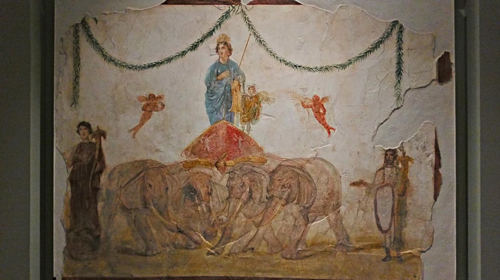 Between IX.7.7 and IX.7.6 Pompeii. December 2019. 
Upper part of painting of Venus riding in a chariot pulled by elephants, from pilaster on east side of doorway.
On display in exhibition “Pompei e Santorini”, Rome, 2019. Photo courtesy of Giuseppe Ciaramella.

