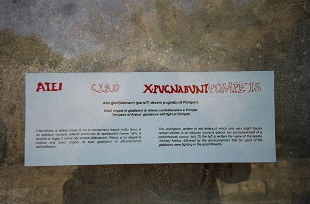 IX.8.2 Pompeii. October 2009. Explanation of painted latin graffiti.Photo courtesy of Rick Bauer.
