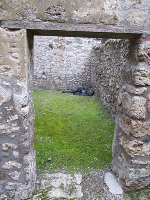 IX.8.6 Pompeii. March 2009.  Room 23, Lararium in south east corner of Room 22, Atrium of servants quarters.

