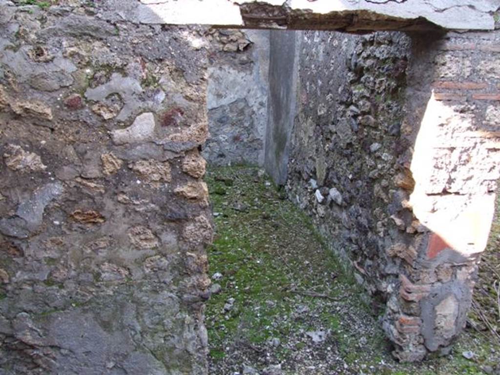 IX.9.13 Pompeii.  March 2009.  Doorway to Room 9. Kitchen. Looking north.
