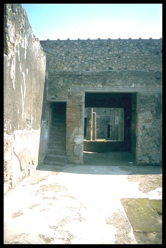 IX.14.4 Pompeii. Room 27, secondary atrium of IX.14.2, looking south through tablinum 19. 
Photographed 1970-79 by Günther Einhorn, picture courtesy of his son Ralf Einhorn.

