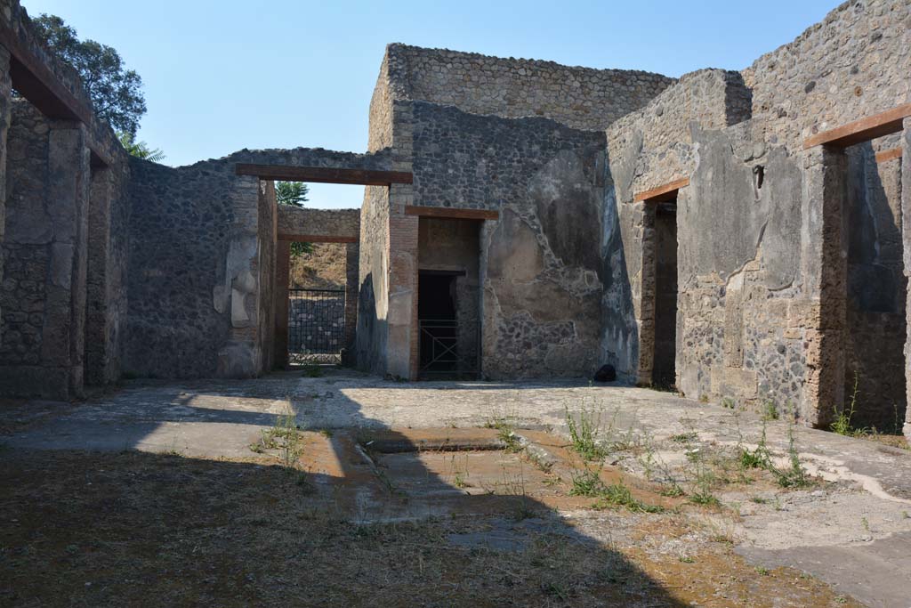 IX.14.4 Pompeii. July 2017. 
Secondary atrium 27, north side with central entrance doorway/corridor with doorway to stairs (numbered 35), on its right, and into doorway to room 31.
Foto Annette Haug, ERC Grant 681269 DÉCOR.


