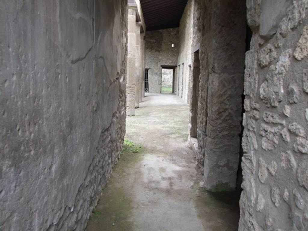 IX.14.4 Pompeii. December 2007. Staircase (m) in south-west corner giving access to rear upper level.