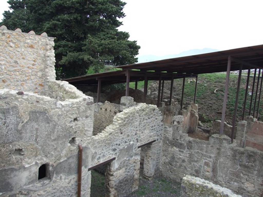 IX.14.4 Pompeii. December 2007. Looking south-east from rear upper level to rooms 7, 8 and 9 and to IX.14.c.